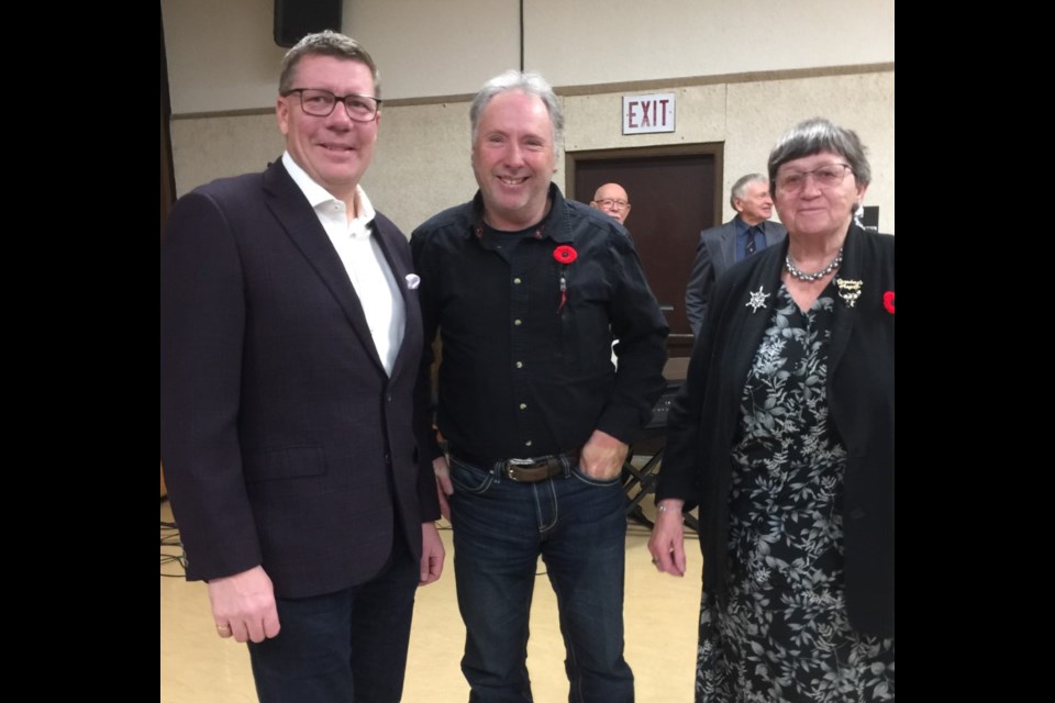 Premier Scott Moe, Reeve Gary Nickel and Lorraine Olinyk at the Borden and District Lions Club Remembrance Day service in the Borden Community Centre on Nov. 11.