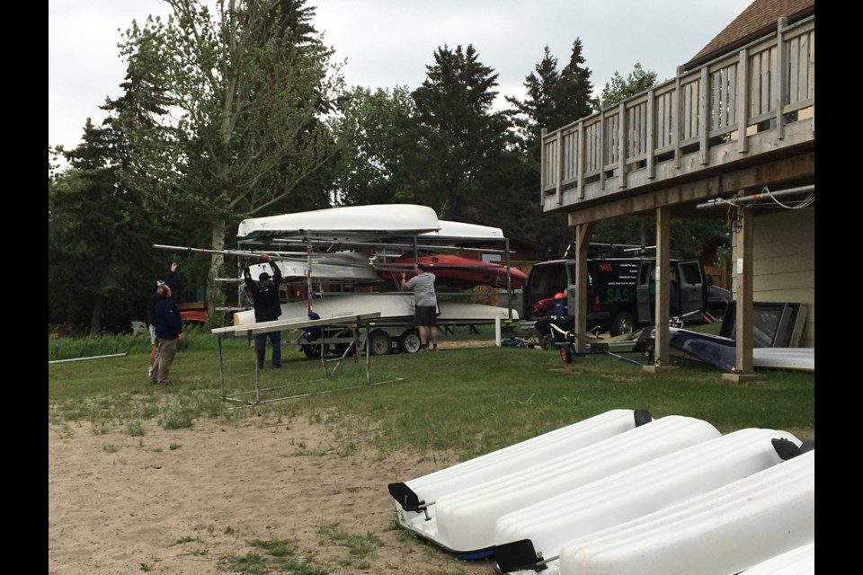 Gear gets unloaded in preparation for Sask Sail sailing lessons on Jackfish Lake hosted by Meota Lake Shore Paddle and Sail. 