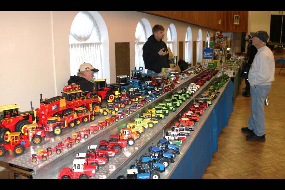 Many vendor tables were stacked with collectable farm toys.