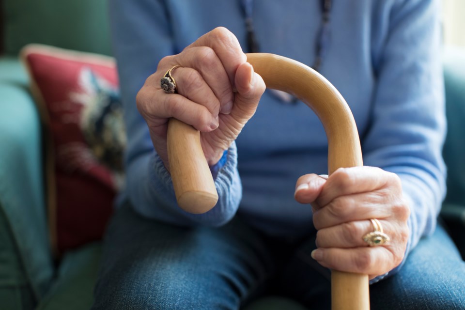 Woman with cane