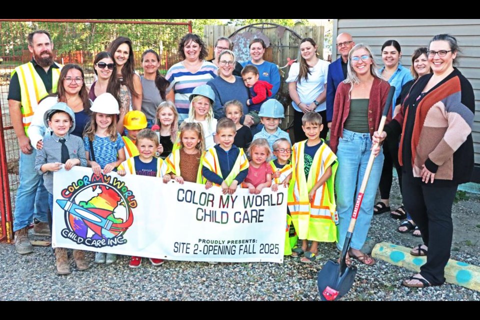 The parents board, children and guests gathered for the ground-breaking to officially kick off a major expansion of Colour My World day care on Tuesday.