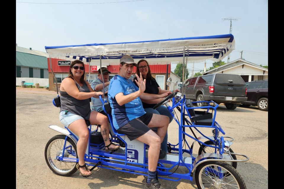 A brand new bike in its inaugural run for Prairie Branches on June 13 included staff member, Tiffany Longe and Darcy Koenig back row with Iain Stubbington and Kim Dainard in the front row.