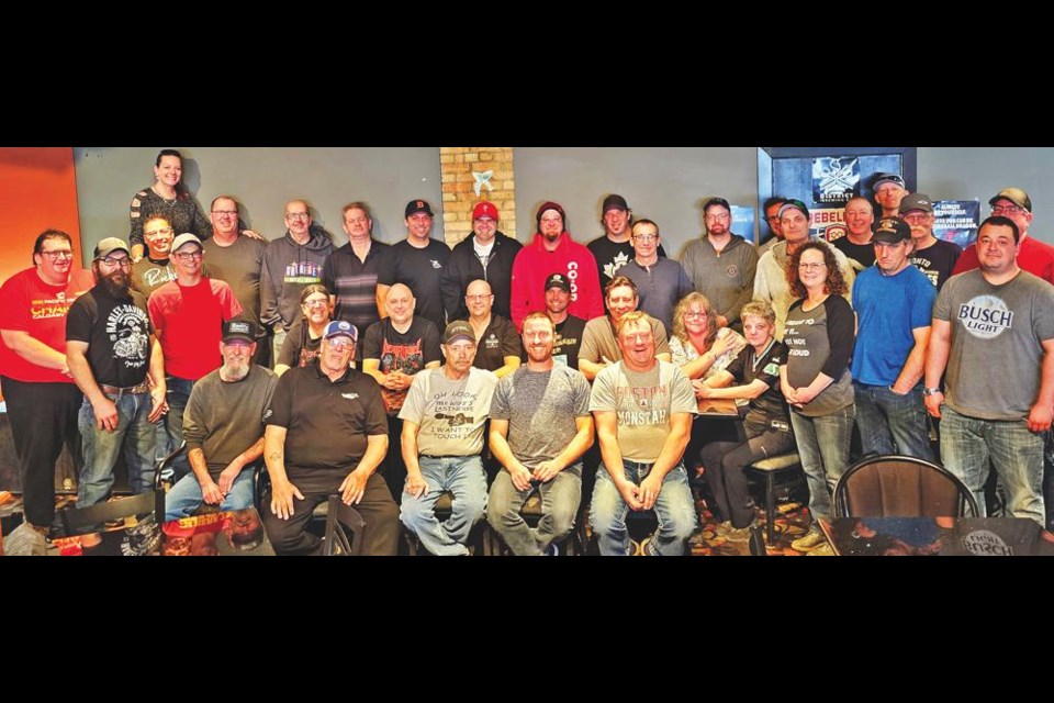 The participants in Detour's Brews and Cues pool league gathered for the league's final evening, where they raised $1,500 for the Weyburn Humane Society.