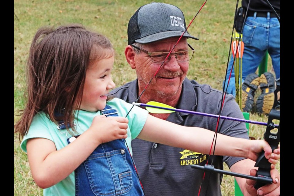 Ruth Frayn tried out archery, with the help of John Tilley of the Weyburn Wildlife Federation, at the family fun day held on Saturday at the WWF clubhouse.