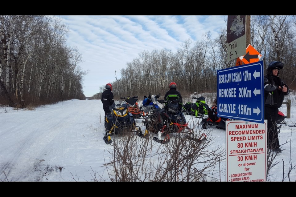 One of Moose Mountain Snowmobile Club’s many trails and signage replaced each year to ensure the safety and guidance needed by riders. 