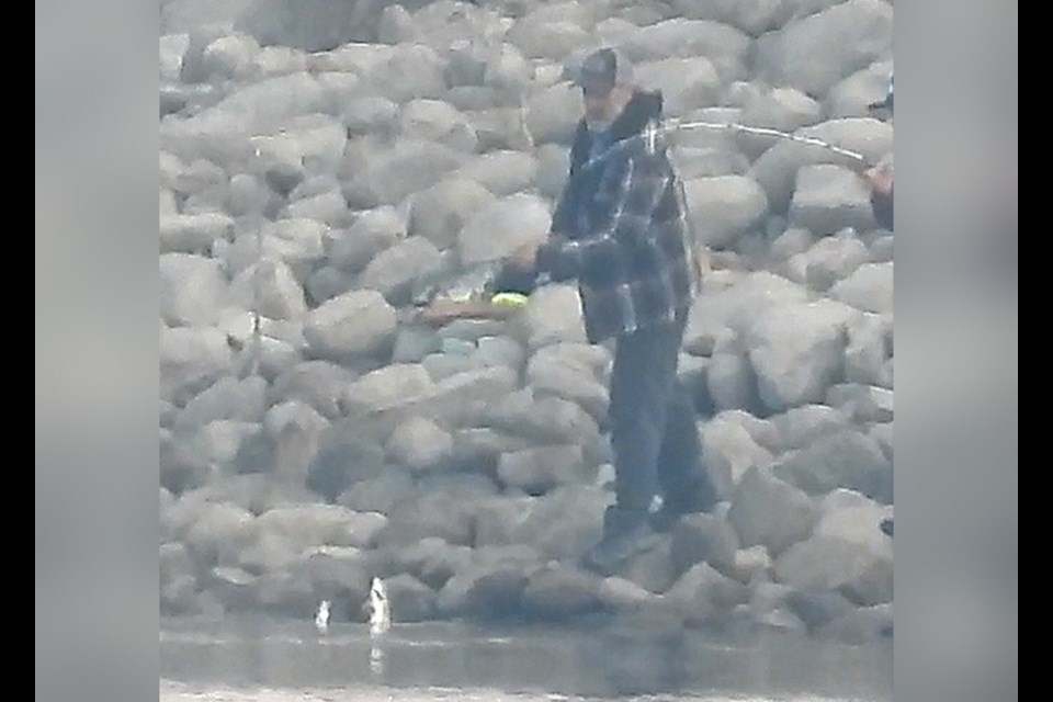 This man was seen fishing from the old marina near Goodwin House.