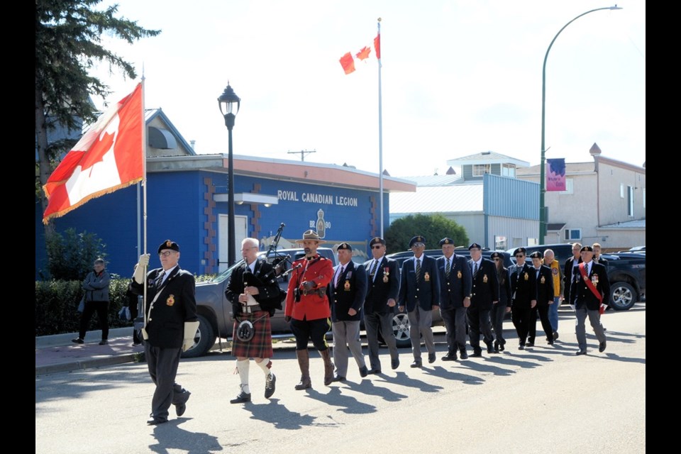 Ten Unity Legion Branch No. 90 members marched down Main St. to the Memorial Park, where the base of the cenotaph was rededicated during National Legion Week.