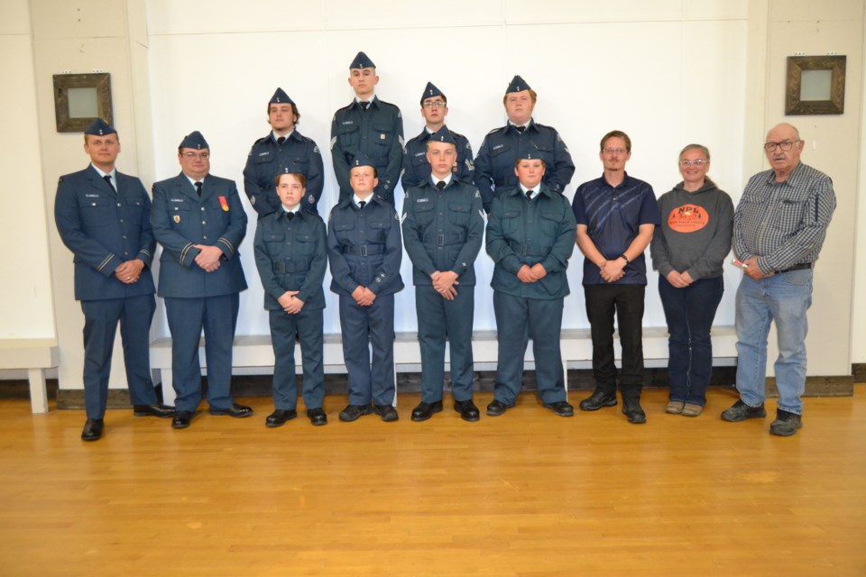 Members of the Preeceville Harvard Air Cadets from left, were: (back row) Kaulen Katryniuk, Alex Prestie, Kaiden Bourassa and William Howard and (front) Nathan Karcha, Lieutenant Troy Rogowski, Captain Henry Bertram, Boden Heskin, Seth Reynolds, Connor Burym, and civilian instructors Dustin Hamilton,  Levi Young and Ian Abbott.