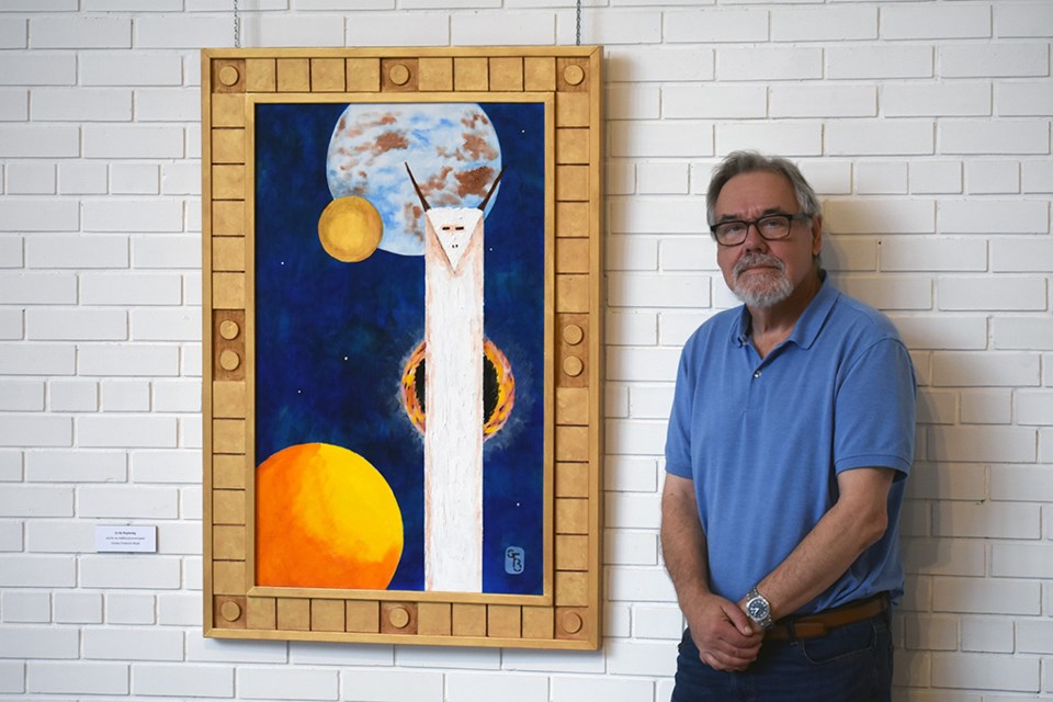 Gordon Bland pictured with the first of his series, In the Beginning, Allegories - Meditations on Religion and Society.