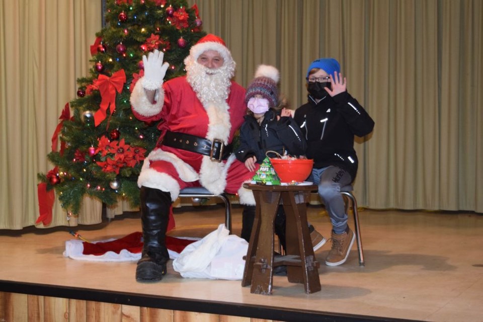 After the pandemic kept Santa Claus away from Canora community functions in 2020, the jolly legend from the North Pole made his return trip to Canora. Layla Keyowski and her big brother Jevon were among the youngsters who got to visit with Santa on December 4 at Rainbow Hall. / Rocky Neufeld

