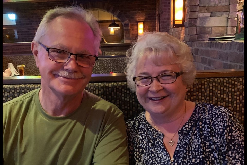 Roger Ogram, left, shown with his wife.