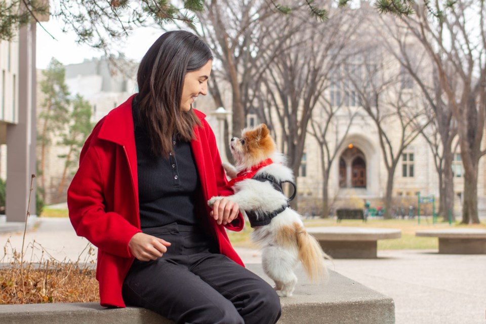 Amélia Gagnon and her dog Cookie became certified as a St. John Ambulance therapy dog team during Gagnon's studies at USask. 