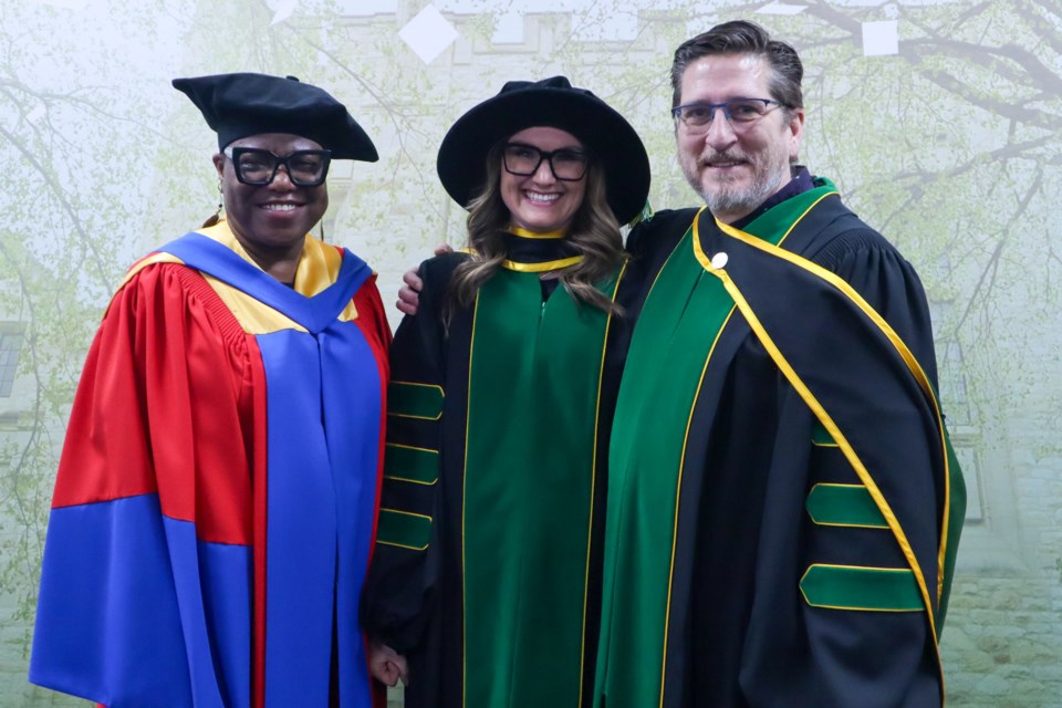 Diana Jemieff Hayes (middle) with her supervisor, Dr. Janet Okoko (left), and EADM department head Dr. Paul Newton (right). 