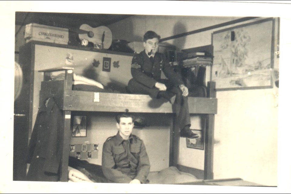 Former USask alumnus/staff member Gordon Patterson (top bunk) in a German prisoner of war camp during the Second World War. 