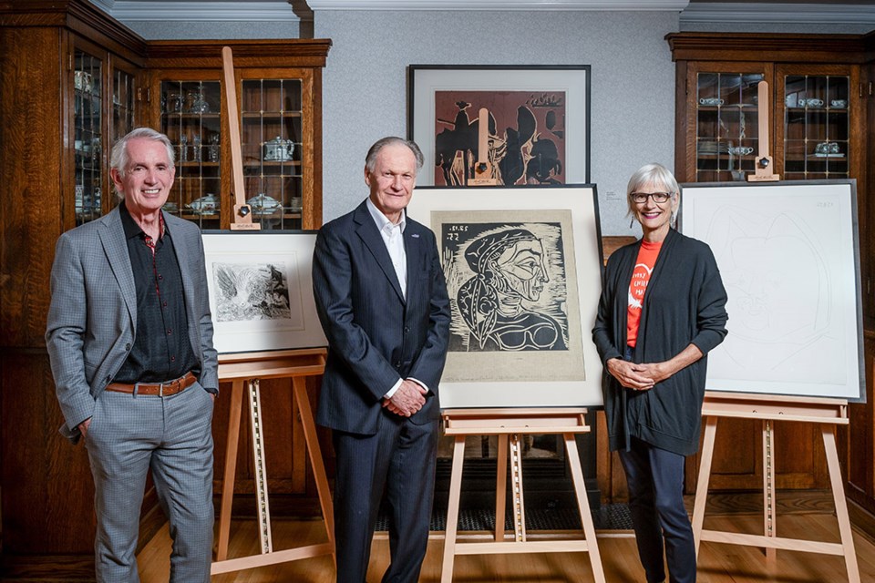 USask alumnus Dr. Frederick Mulder (PhD) and his donation of three prints by Pablo Picasso, with USask President Peter Stoicheff (left) and Kathryn Warden (right). 