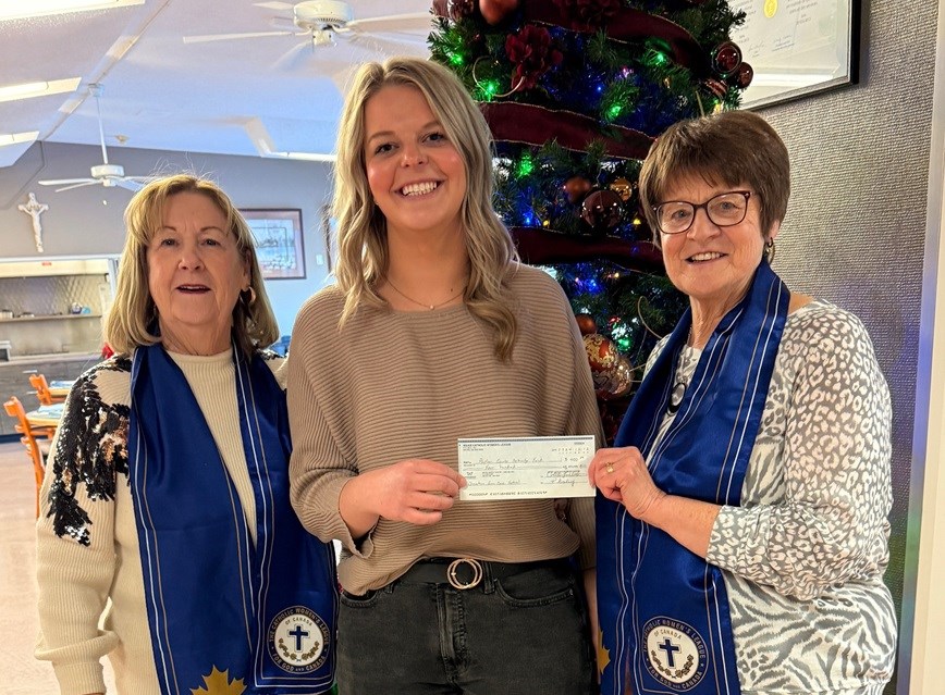 Gayleen Mann and Pat Exley with the Wilkie CWL made a donation of $400 to Jessi Pernitsky at Poplar Courts following their annual Christmas Carol Festival