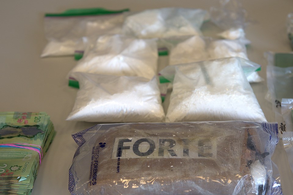 Fentanyl, cocaine and methamphetamine, along with cash, were seized.