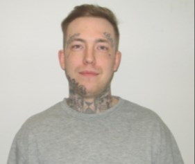 Schnieder is described as approximately 5’6” tall and 140 lbs. He has green eyes and brown hair. Schnieder was last seen wearing a red t-shirt and blue jeans. Schnieder has multiple tattoos, including a skull on his right hand, a rose on his left hand, lettering on his eyes and cheek, and multiple other tattoos on his neck, arms and fingers. 