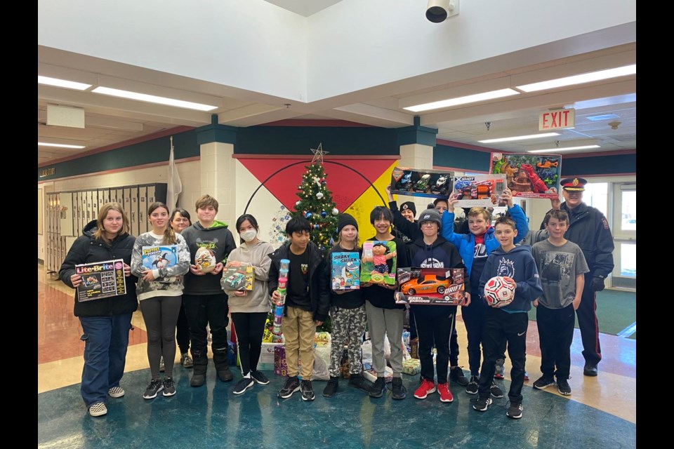 Estevan police members visited local schools to pick up donations for Angel Tree program. 