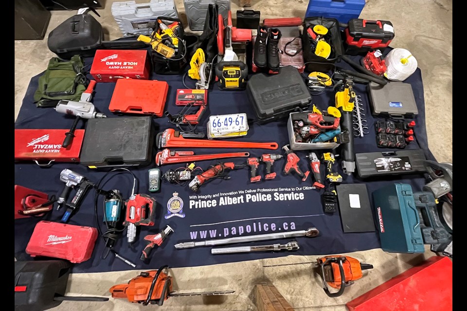 Prince Albert police seized a significant amount of property including firearms, ammunition, and tools. 