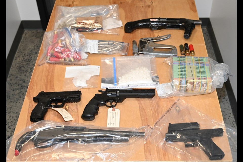 Shown is a photograph of some of the items seized.