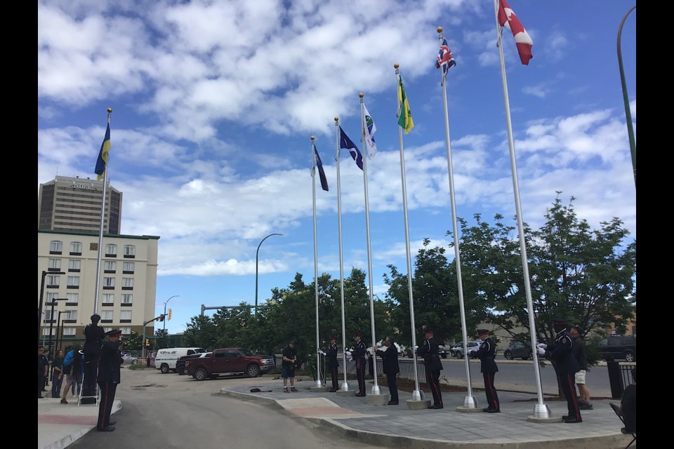 The scene at the flagraising for the new Regina police services building.