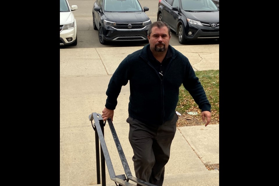 Joseph Sproull entering the court house.