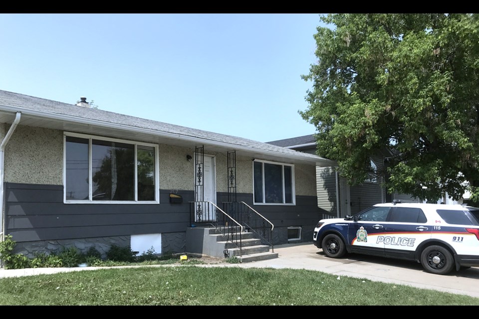 Saskatoon Police Service remained at a house Wednesday afternoon following a murder in the morning. 