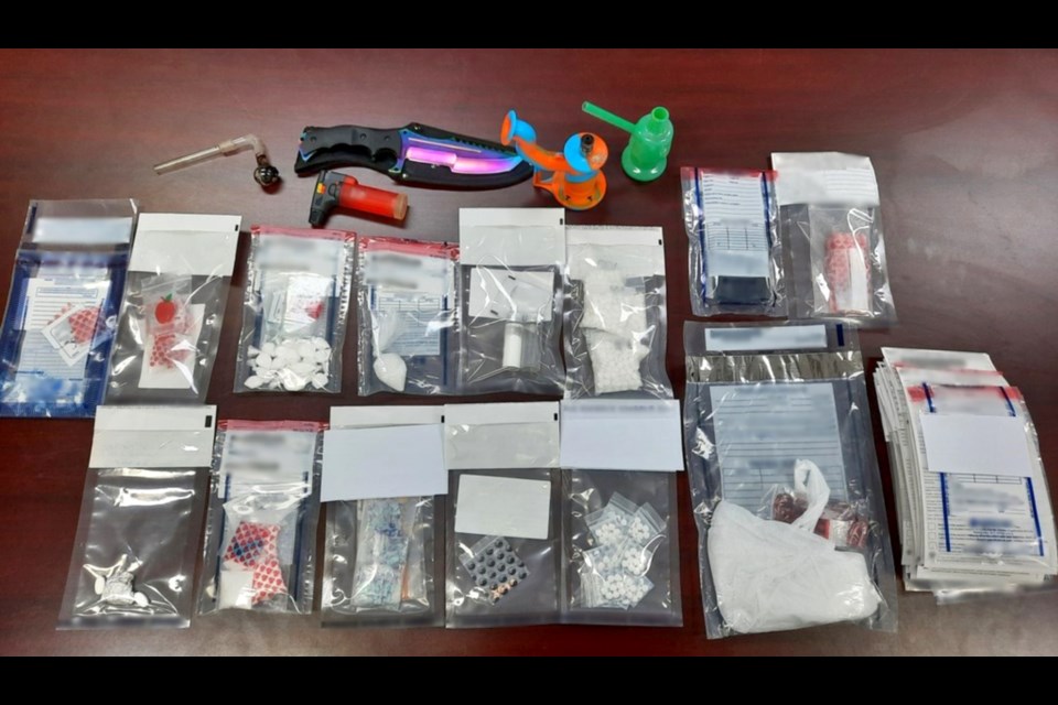 Drugs and items seized by police from a ditched car near Yorkton.