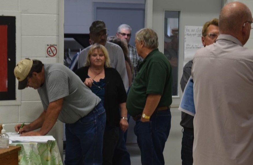 RM of Buchanan ratepayers patiently waited in a long lineup to register for the public meeting at the Buchanan Community Centre on Aug. 25.