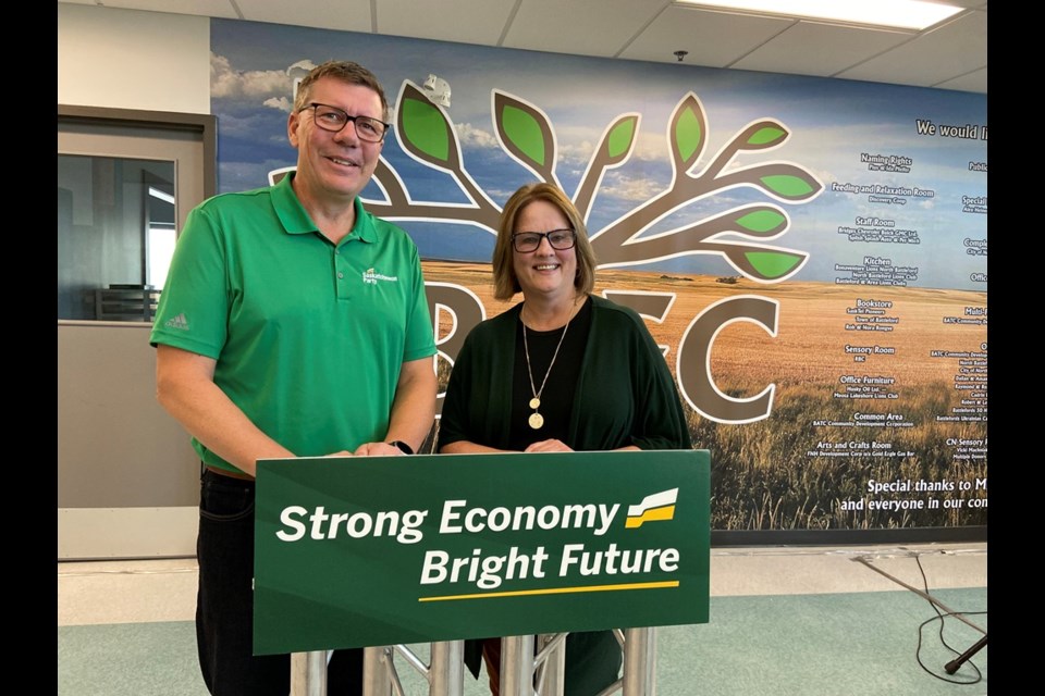 Scott Moe, left, with Mona Leece, executive director of Battlefords Trade and Education Centre (BTEC).