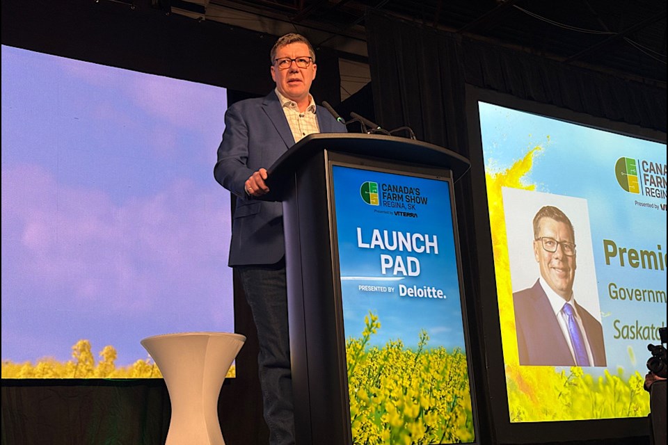 Premier Scott Moe gives opening remarks Tuesday morning at Canada’s Farm Show.