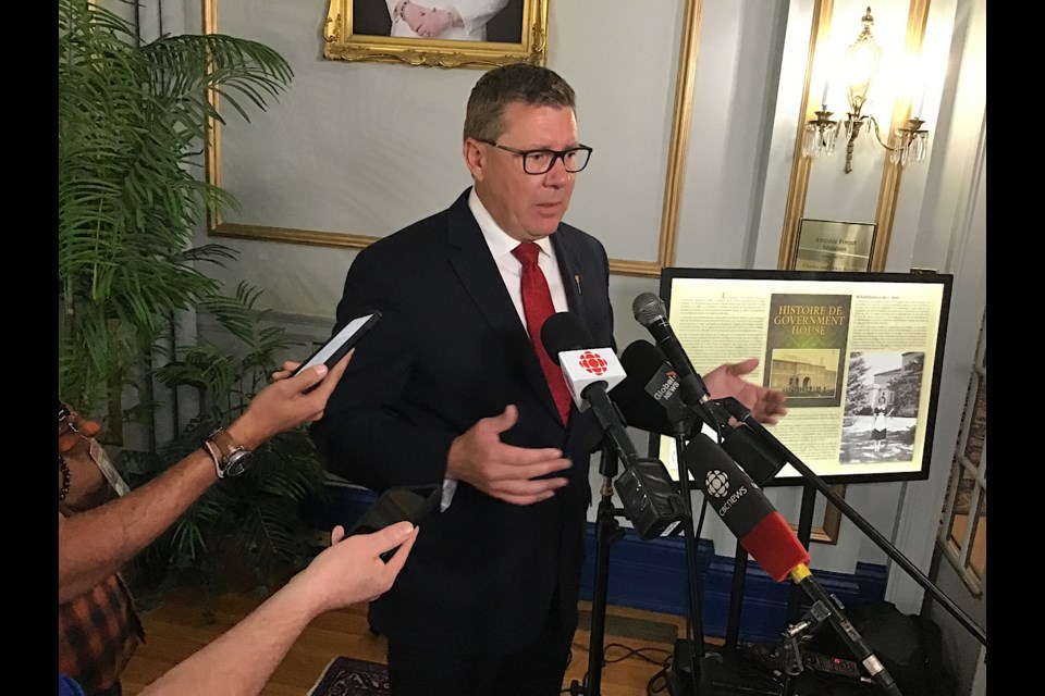 Premier Scott Moe speaks to reporters at Government House following cabinet shuffle.