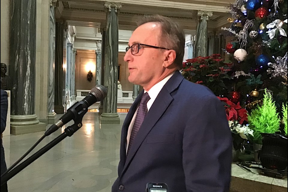 Jim Reiter speaks to reporters at the legislature Dec. 2 on the Saskatchewan Affordability Act which he introduced that afternoon.