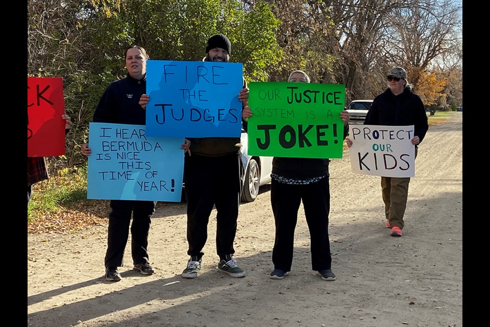 Radisson residents hit the streets Saturday and chanted “protect our kids” to protest the 47-year-old known as Sir Brent Habetler living in their town.