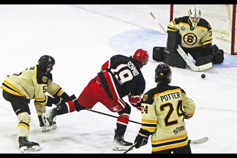 Red Wings player Lucas Schmid fired the puck on the Estevan net, during Saturday night's game in the Highway 39 Series.