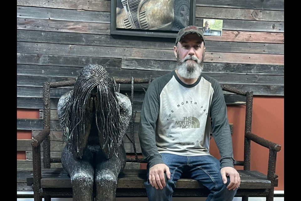 Weeping Willow’s Fractured Heart is a commissioned sculpture inspired by Melfort artist Rob Jung’s original Weeping Willow piece. A heart is etched on her inner left wrist, and she holds an angel feather in the palm of her hand.