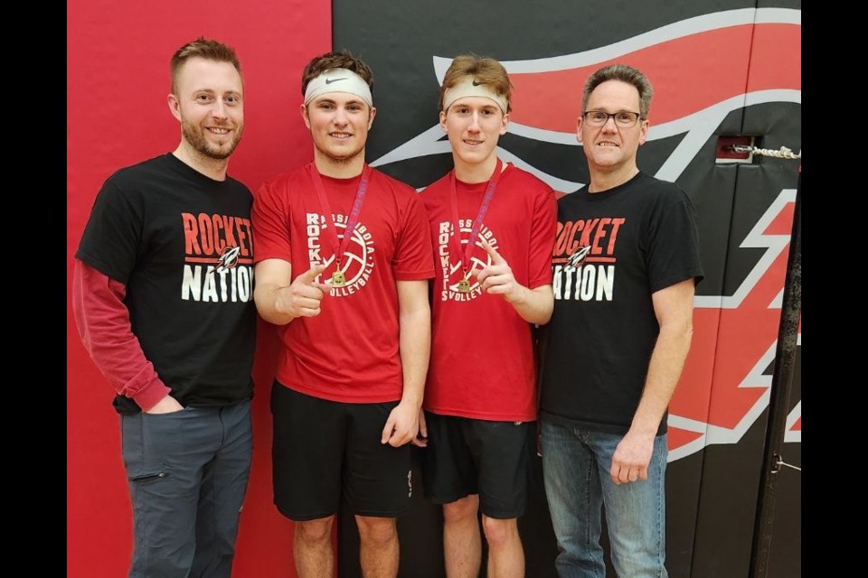 Keaton Hillmer and Ty Reid (centre) with their badminton coachs Matthew Lothian and Curt Hawkins. Hillmer and Reid won gold at the badminton regionals, held in Rosetown.