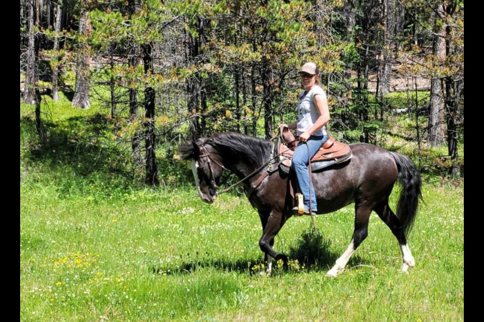 Owner Alison Whitehouse riding her beloved equine, Sarge.