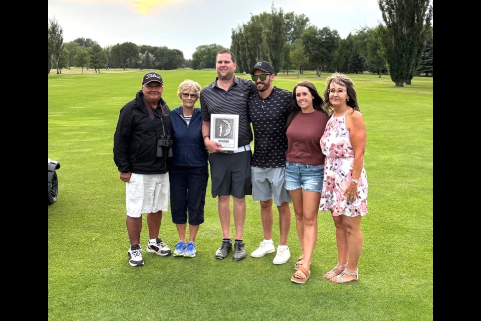 Nolan Rohatyn, third from left, with his family Rick Rohatyn and MaryAnn Rohatyn, and members of the Dave Price family Tyson Price, Taunia Turnbull and Laureen Price. 