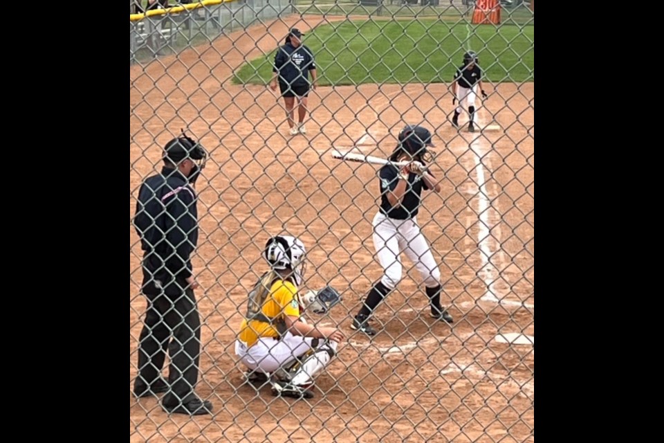 Alynne Hein steps up to the plate, representing the Rivers West district at the Sask. Summer Games.