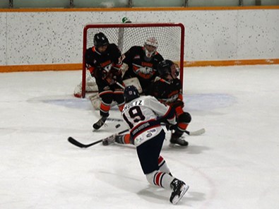 Maddox Shultz of the U18 AAA Regna Pat Canadians (white jerseys), who joined the team as a 14-year-old with exceptional player status, attracted considerable attention for the game against the Yorkton Maulers and did not disappoint his fans, scoring two goals and adding an assist in a 5-2 win for Regina. 