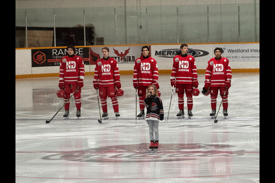 Scarlotte Nistor sang the national anthem to start of the game.

Cutline 1: Estevan Bruins goaltender Benjamin Polhill made many spectacular saves throughout the game. Photo by Stephanie Zoer