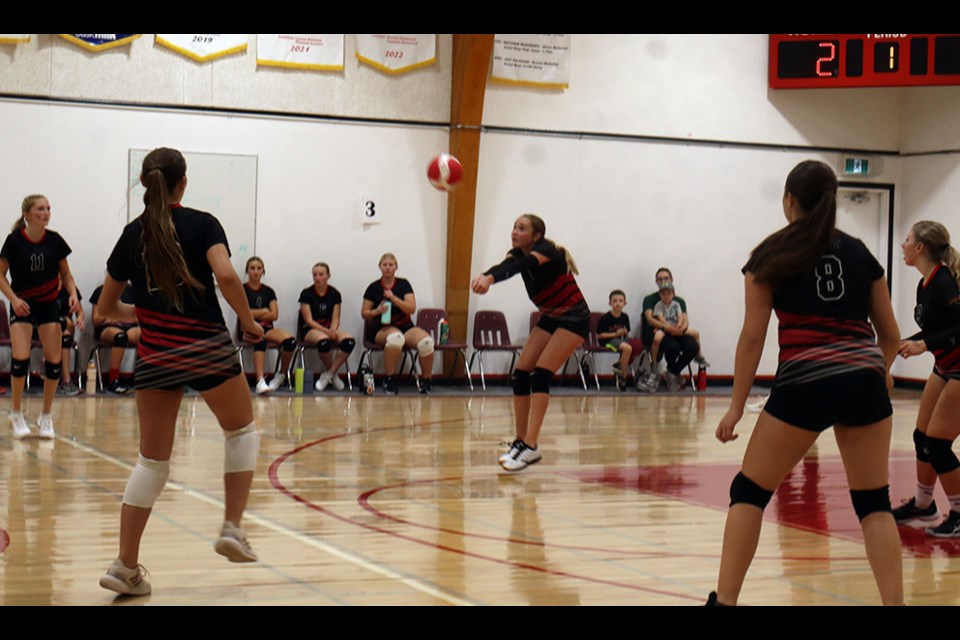 Kirsten Snoeij of the CCS Cougars junior girls basketball team dug out this serve against the Norquay Knights on Sept. 25. She was supported by teammates, from left: Aubrie Monette, Cassidy Wolkowski, Maddy Dutchak and Isabelle Chabun.