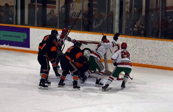 Troy Zulyniak (centre) celebrated after he scored from a scramble in Game 2 for the Canora Cobras in provincial north semifinal action versus the visiting Dinsmore Dynamos on Feb. 24 in Canora. 