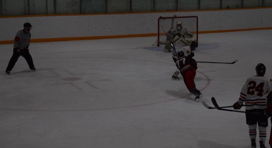 Troy Zulyniak scored twice, including this well-placed screened shot to open the scoring in the second period, as the the Canora Cobras downed the high-flying Langenburg Warriors 5-2 in Canora on Jan. 21.