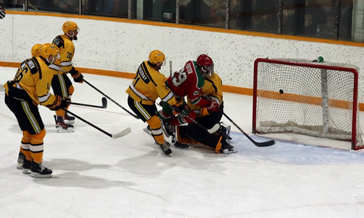 Logan Foster of Kamsack somehow battled his way past four Theodore Buffalo defenders, plus the goalie, to score his first of two goals on the night for the Cobras.