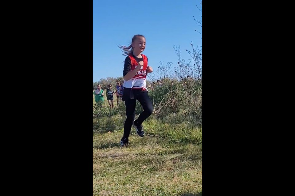 At the Saltcoats Autumn Summit on Sept. 27, Riley Roberts of CCS appeared to be enjoying her run in the U10 age group, finishing 23rd out of a group of 70 runners.