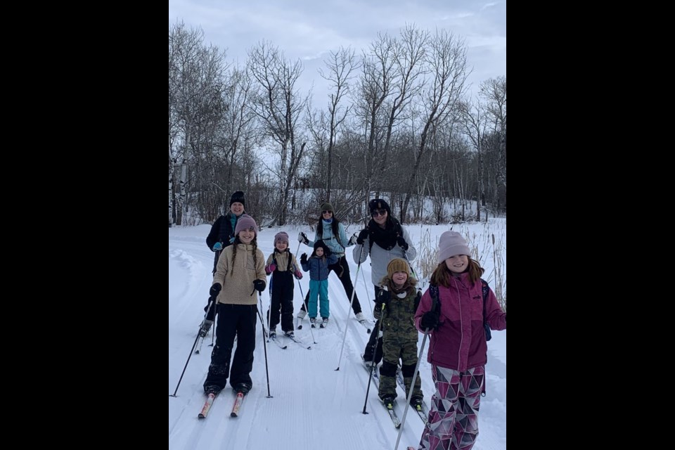 By all reports from the trails, it was a great day for skiers of all ages to be out at the Sandy Beach cross-country ski trails on January 15, with warmer temperatures and good snow conditions. From the back left, were: Gladys Zavislak, Ava Sliva, Emily Mentanko, Lauren Mentanko, Angel Sliva, Gillian Rice, Lowell Rice, and Rachael Mentanko, front right. / Brandi Zavislak