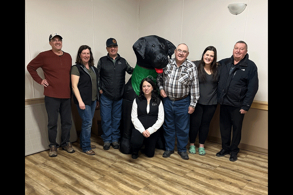 The Ducks Unlimited employees from southeast Saskatchewan that attended the Carlyle event are, from left to right: Bob Neufeld, Kylie McRae, Ross McDonald, Jessica Trembly, Sask volunteer of the year Lorne Scott and auctioneer Ken McCulloch. 